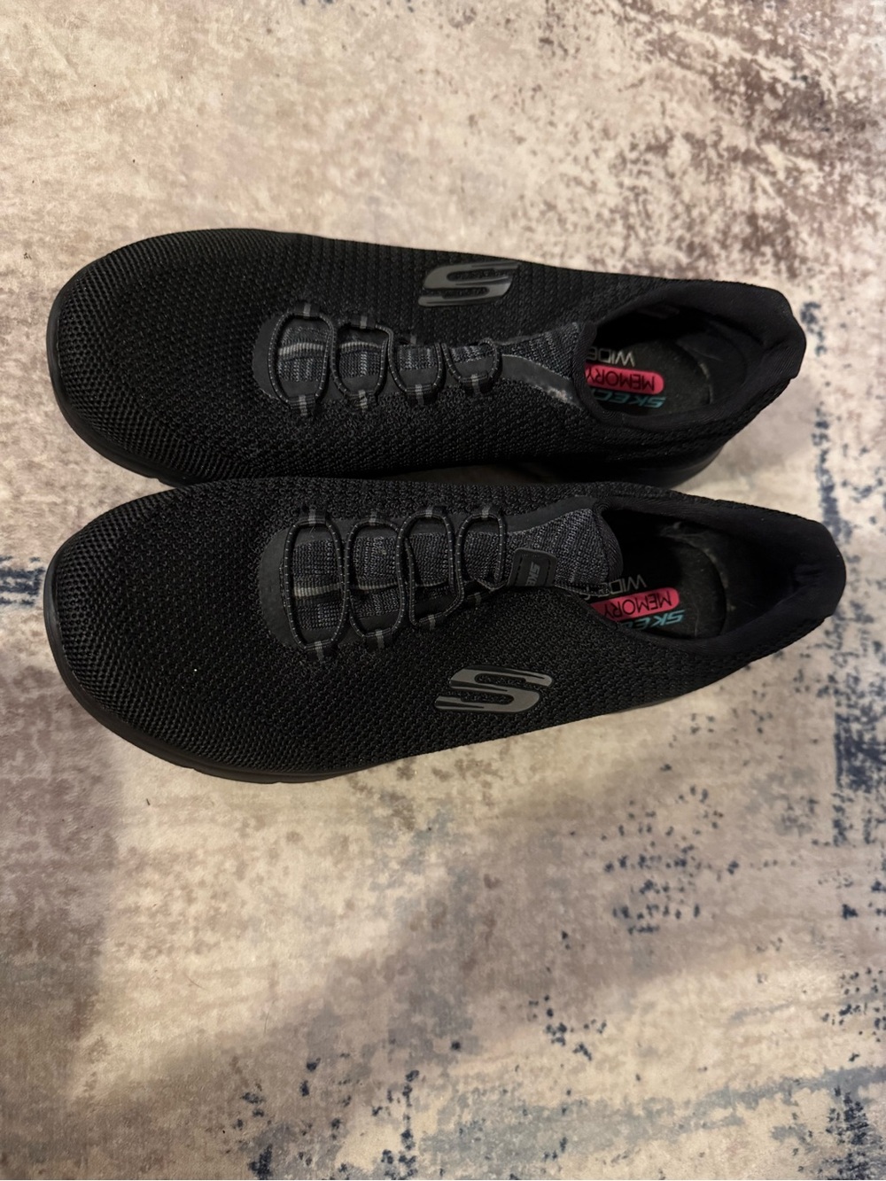Skechers Women's Black Knit Slip-On Sneakers